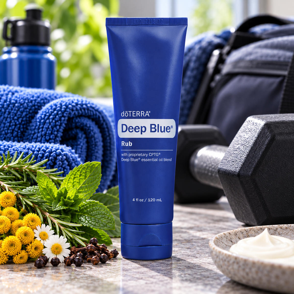 doTERRA Deep Blue Rub 120ml with botanicals in an active lifestyle setting