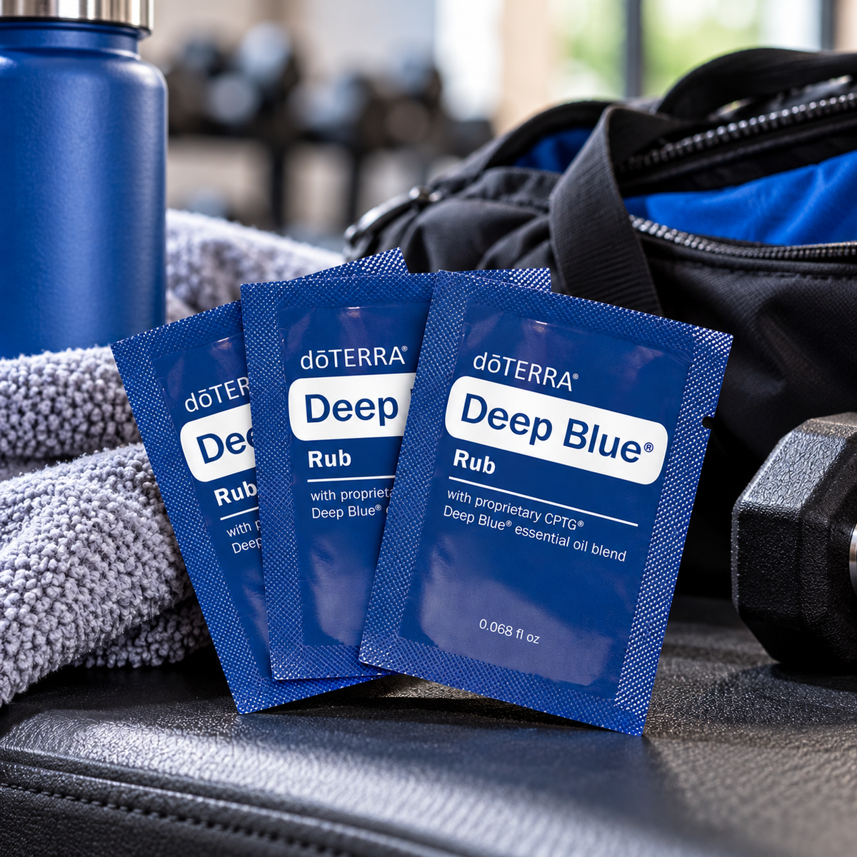 doTERRA Deep Blue Rub 2ml sample pouches in a gym and active lifestyle setting
