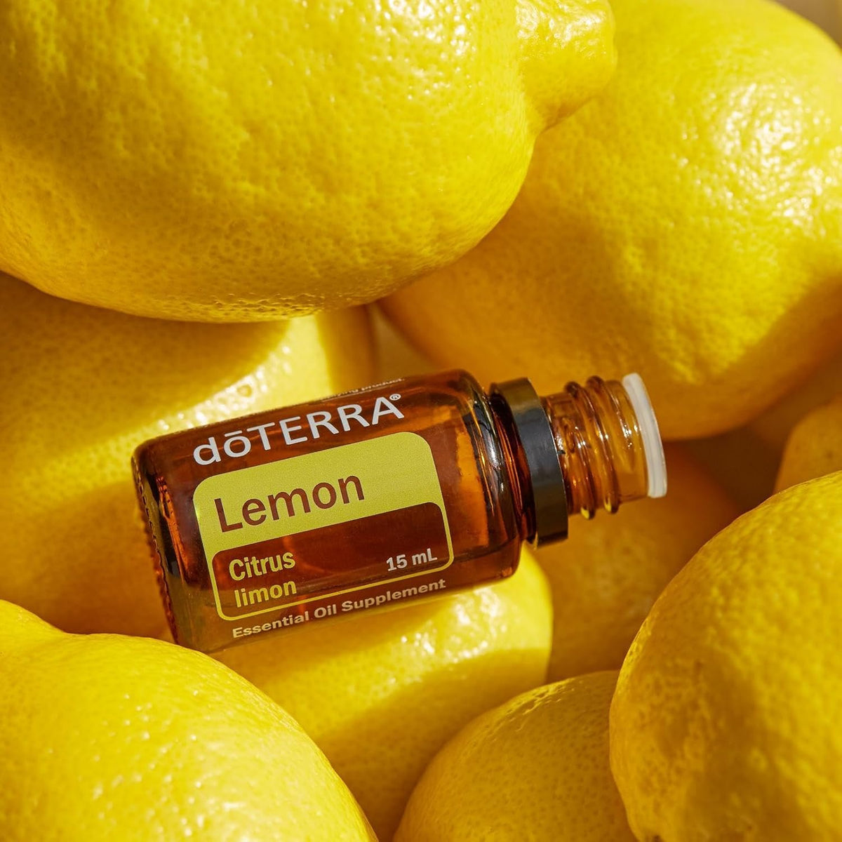 doTERRA Lemon Essential Oil 15 mL with fresh lemons