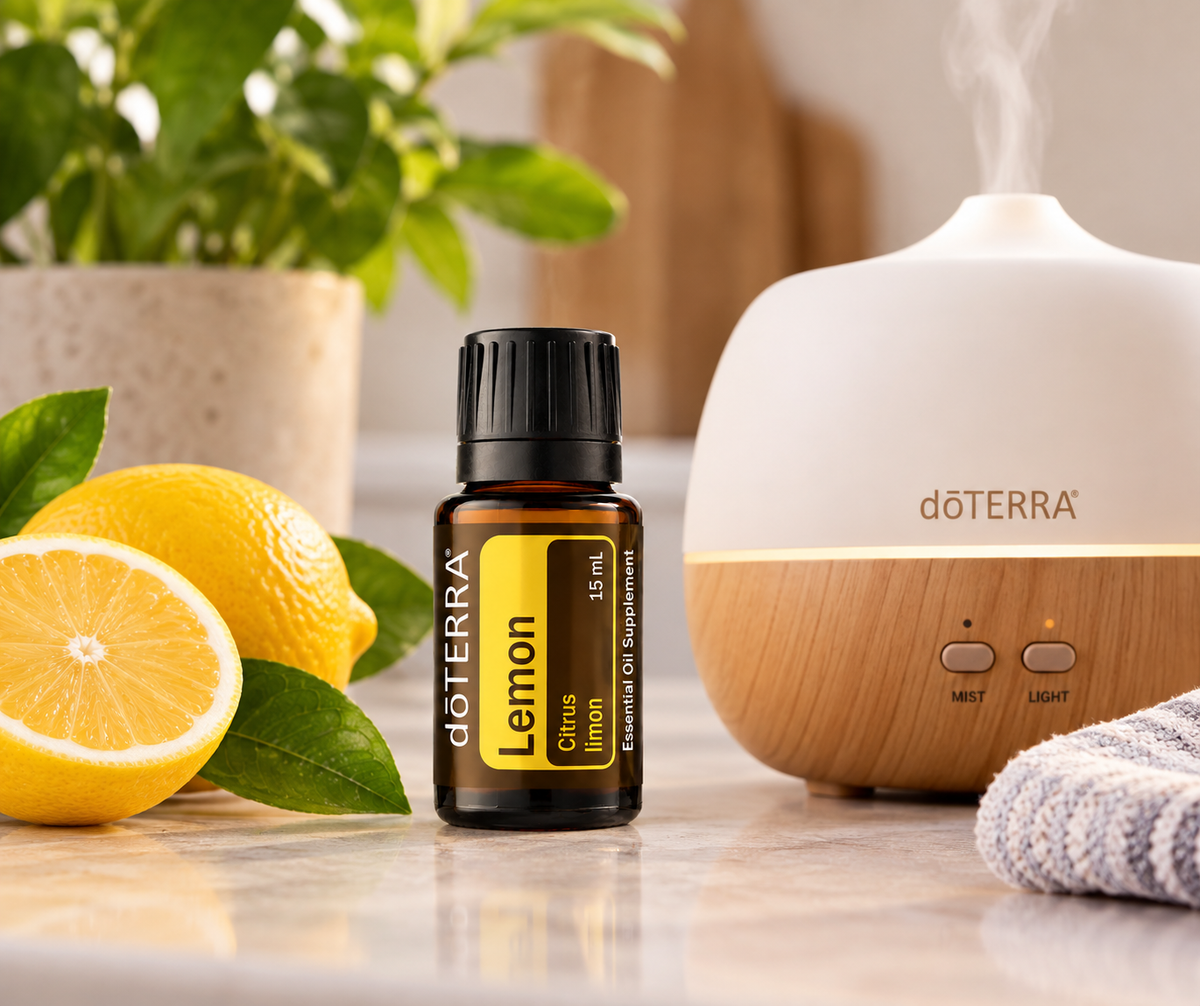doTERRA Lemon Essential Oil beside an essential oil diffuser